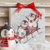 Sledding Penguins 6 Inch Tabletop LED Lighted Print On Canvas With Stand