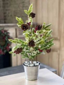 22 Inch Holiday Tree In Silver Bucket With Berries Snow And Pine Cones