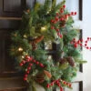 24 Inch Battery Operated Decorative Wreath - 30 LED's - Pine Cones And Red Berries